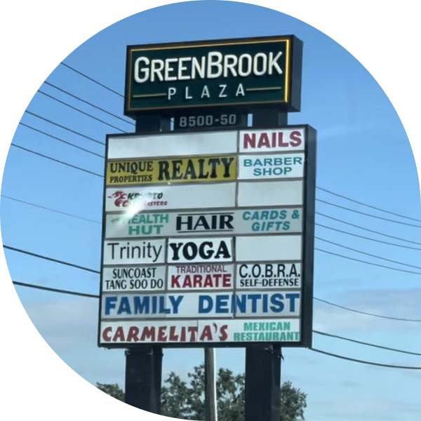 Greenbrook Plaza strip mall in New Port Richey, Florida — original clinic location